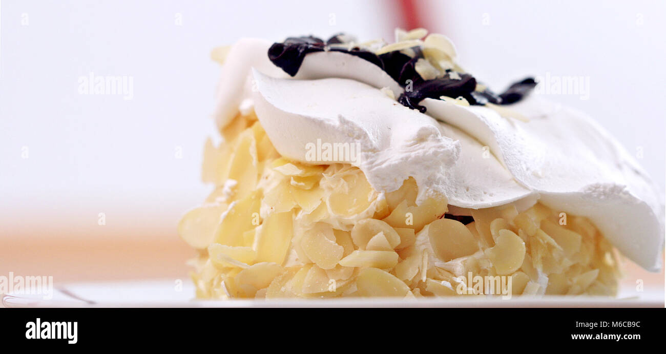 Picture of a Almond white chocolate cake Stock Photo Alamy