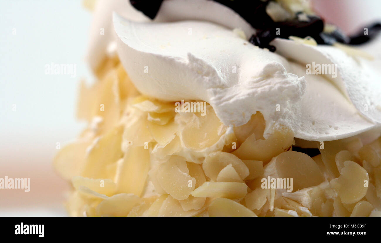 Picture of a Almond white chocolate cake Stock Photo Alamy