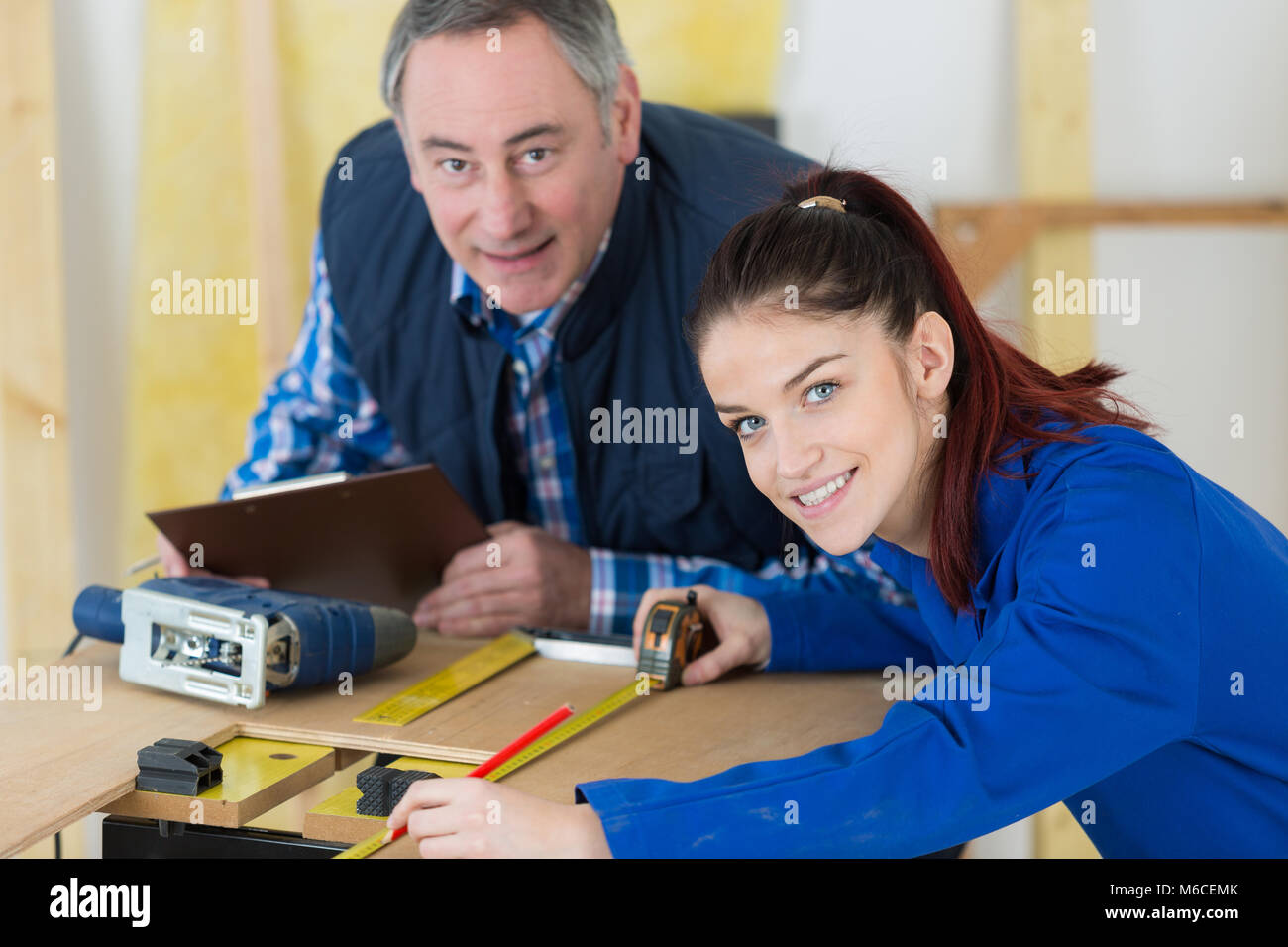 carpenter training female apprentice Stock Photo Alamy
