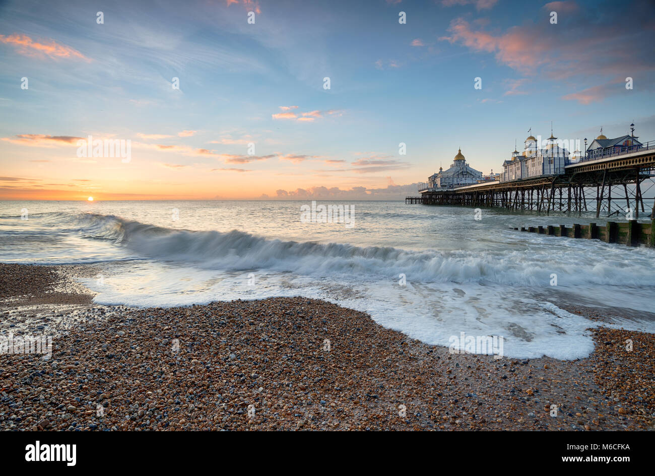 Stunning sunrise at Eastbourne pier on the south coast of Sussex Stock Photo