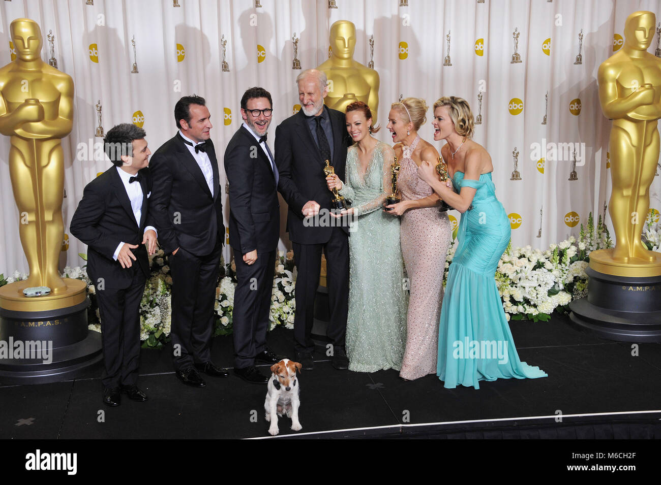 Michel Hazanavicius, Missi Pyle , Jean Dujardin, P A Miller, J Cromwell, 139  press room at the Oscar - 84th Academy Awards at the Hollywood and Highland Theatre in Los Angeles.Michel Hazanavicius, Missi Pyle , Jean Dujardin, P A Miller, J Cromwell, 139 84th Academy of Motion Picture Oscar Awards  2012. Oscar Trophy, Oscar Press Room 2012, winner with trophy in 2012, Oscar Statue 2012  84th Oscars Press Room Stock Photo