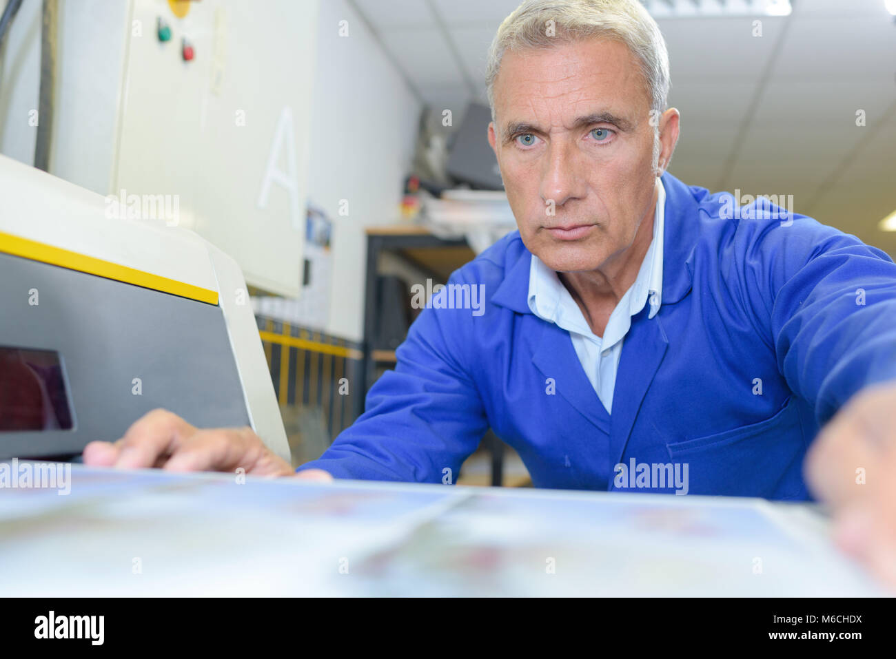 older male steel worker with machine Stock Photo Alamy