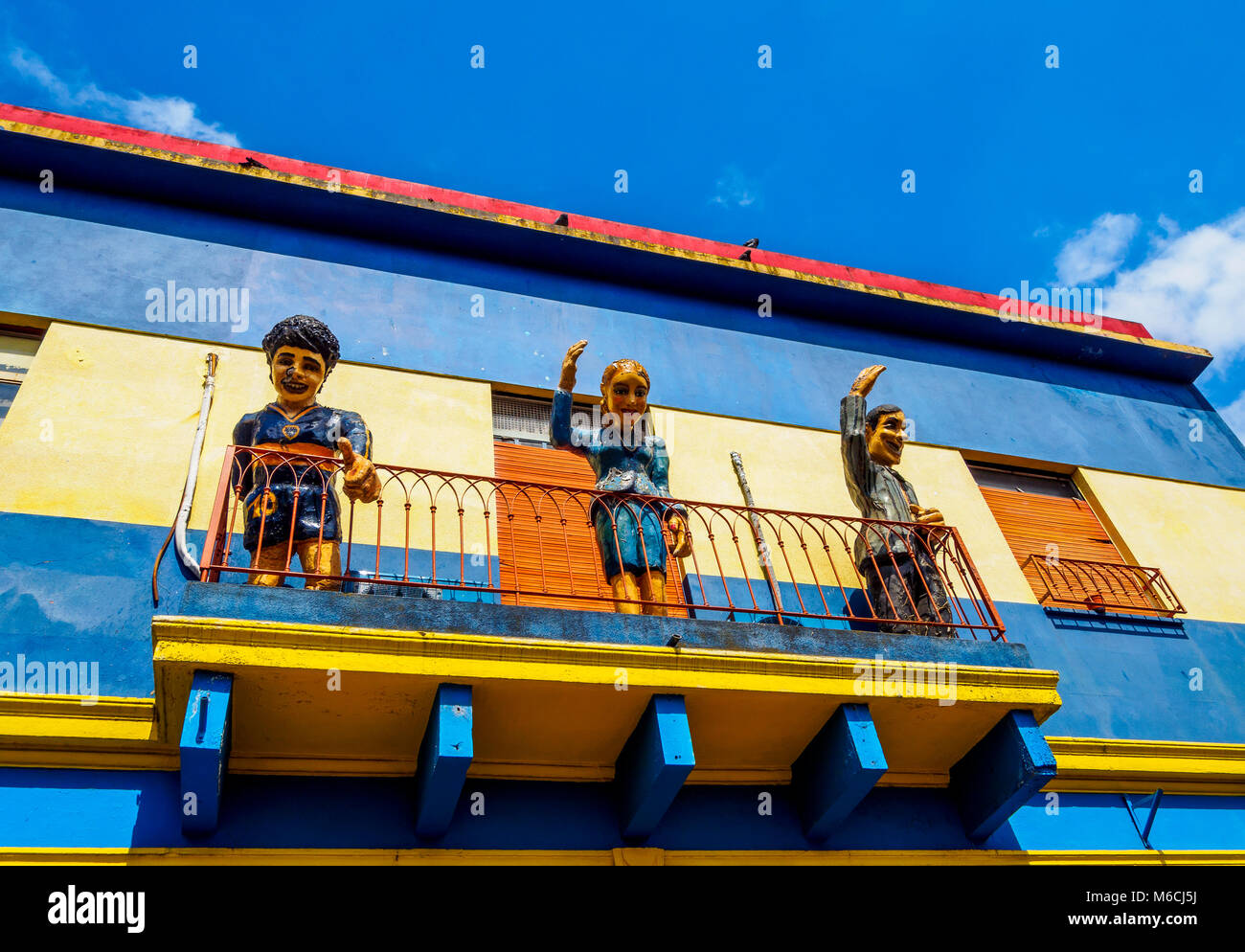 Colourful Figures on balcony, La Boca Neighbourhood, Buenos Aires, Argentina Stock Photo