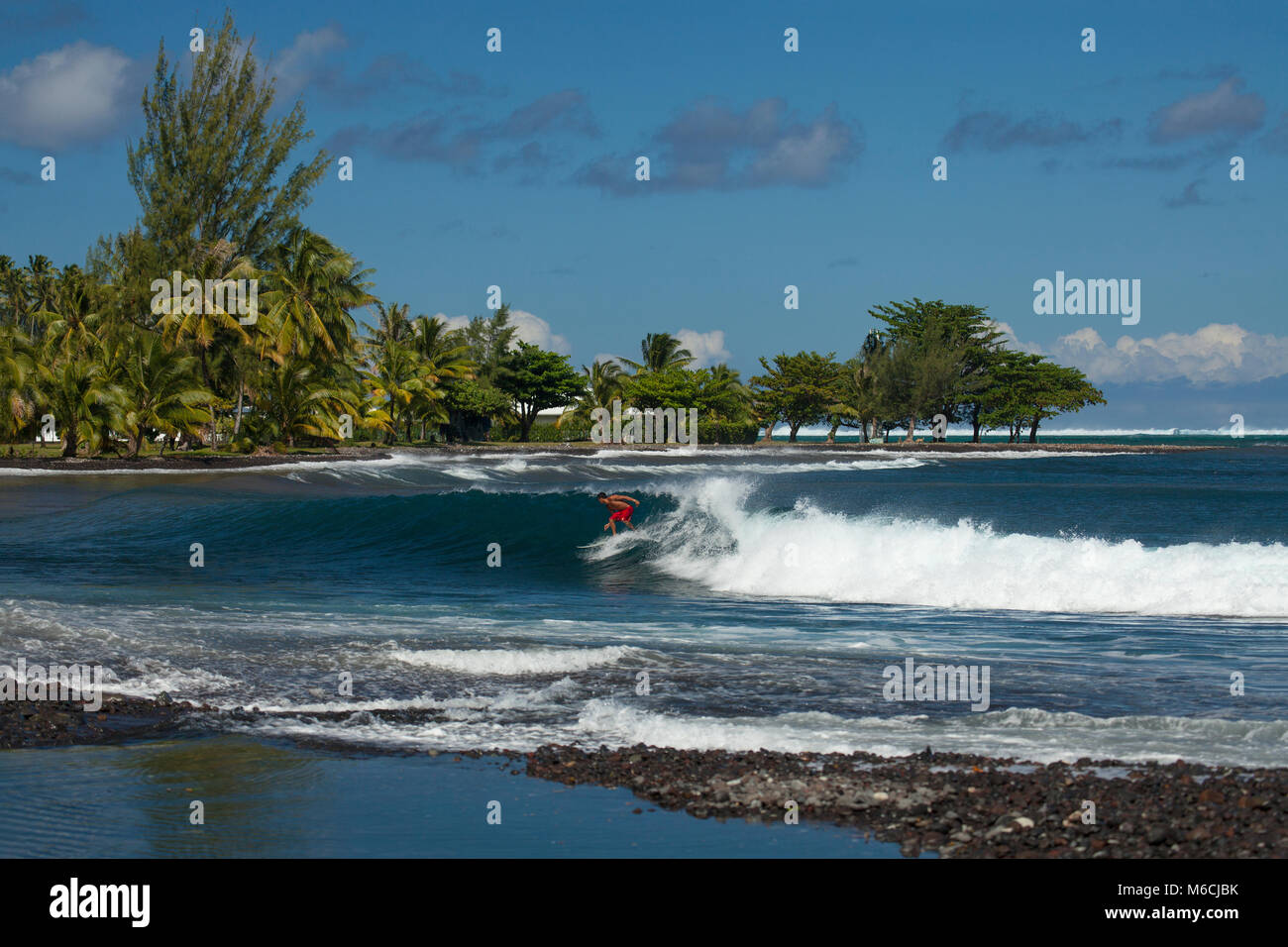 Surfing, Beach of Teahupoo, Tahiti, French Polynesia Stock Photo