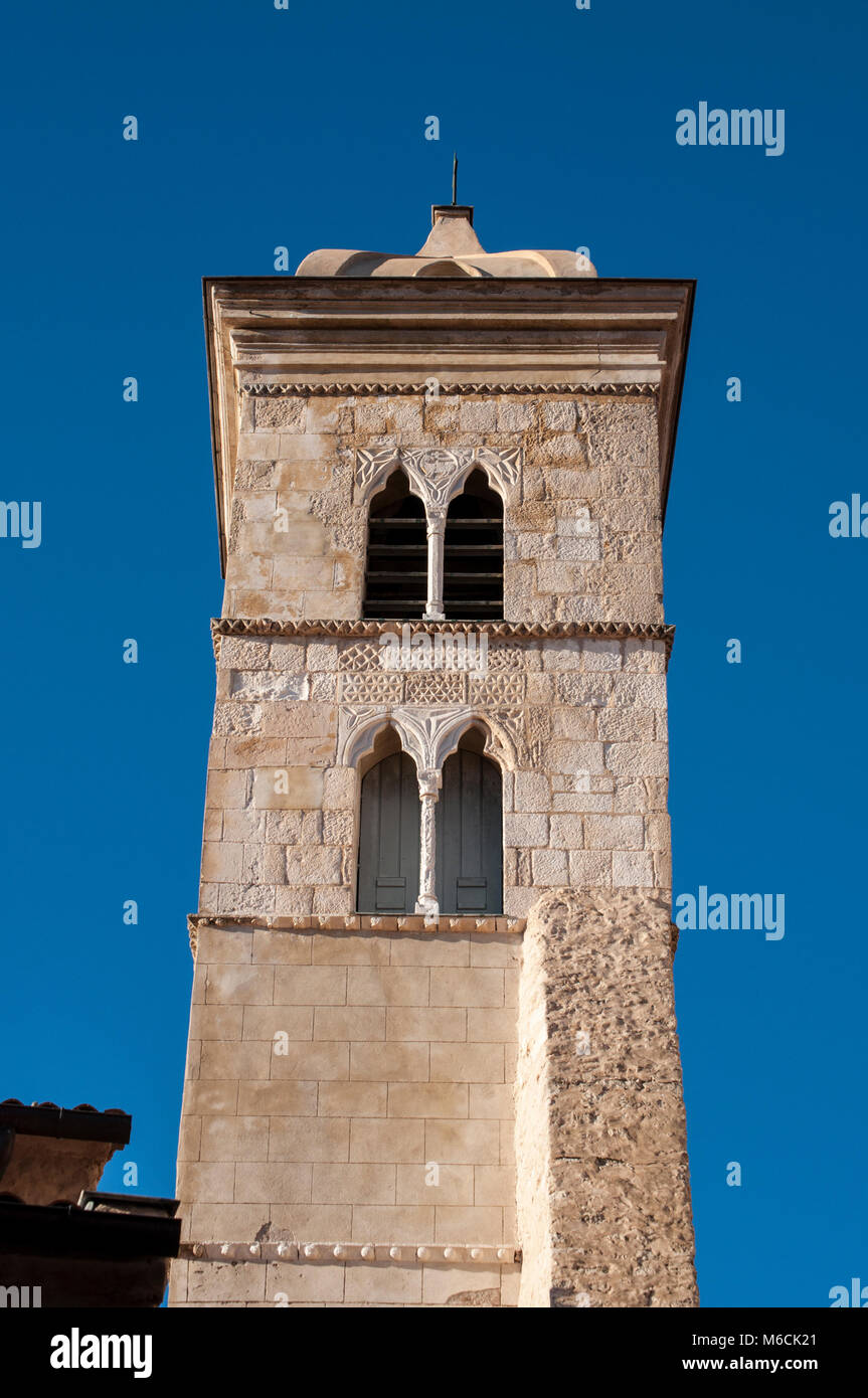 Corsica: the bell tower of the Basilica of Saint Mary Major, a Romanesque-style Roman Catholic church located in Bonifacio Stock Photo