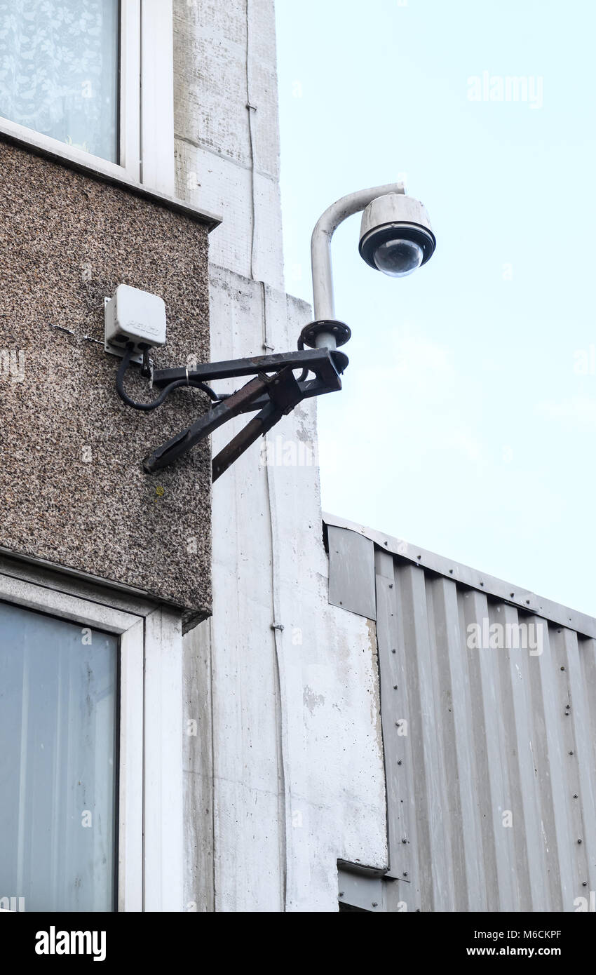 CCTV security Camera mounted on the wall of a high rise tower block in Wolverhampton, West Midlands, UK Stock Photo