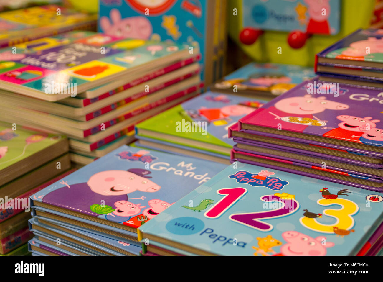 Childrens books, kids book, kid,child Peppa Pig books on Display in a bookshop, London UK Stock Photo