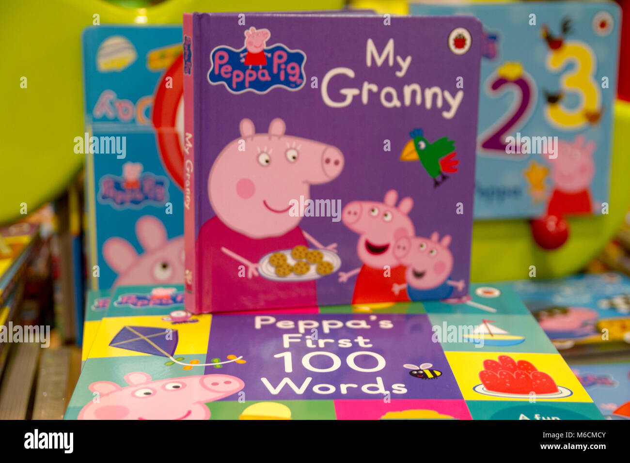 Childrens books, kids, kid,child Peppa Pig books on Display in a bookshop, London UK Stock Photo