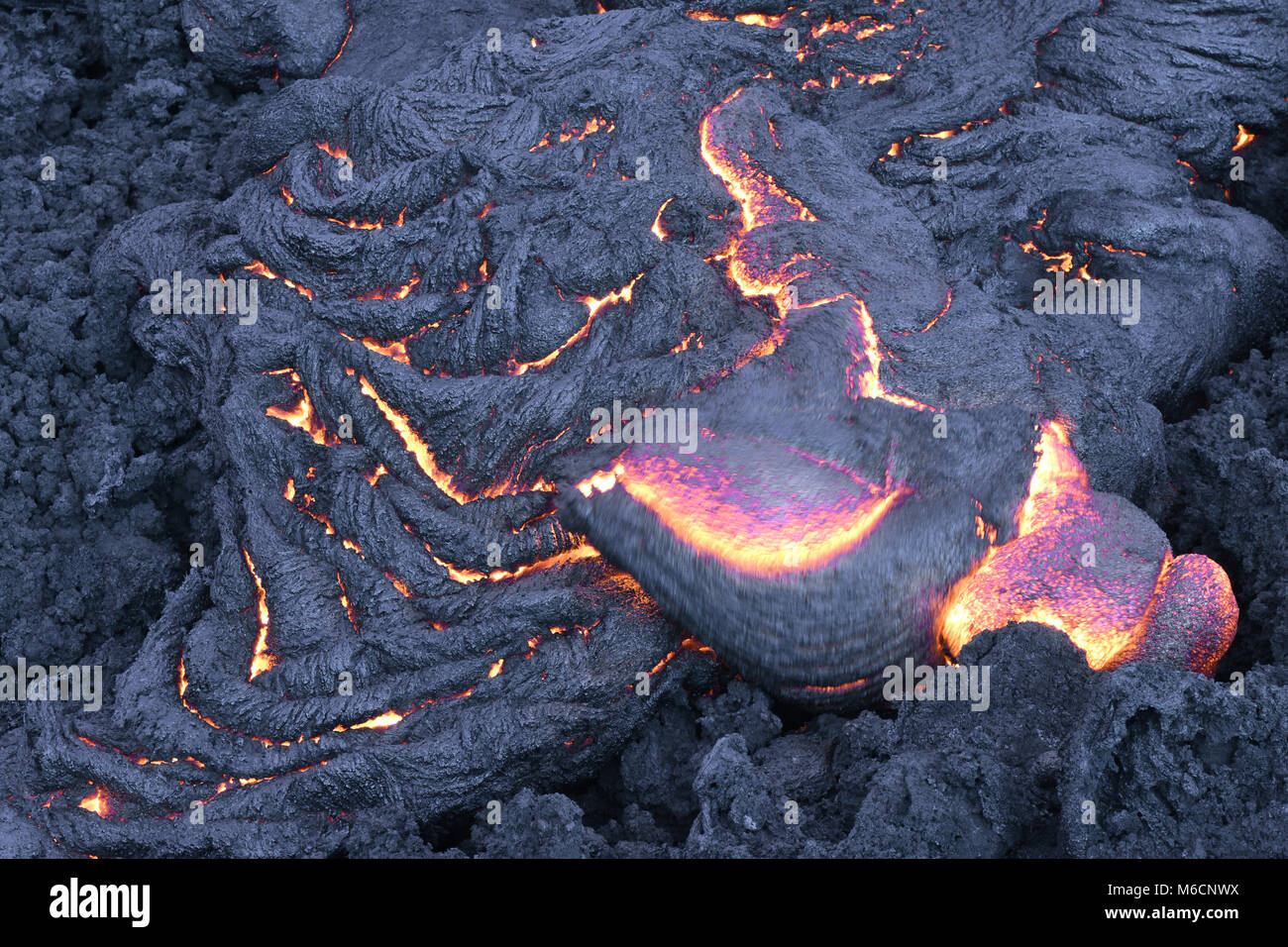 Fresh lava flows creating new rock,  Hawaii Volcanoes National Park, Hawai'i Island, Hawaii Stock Photo