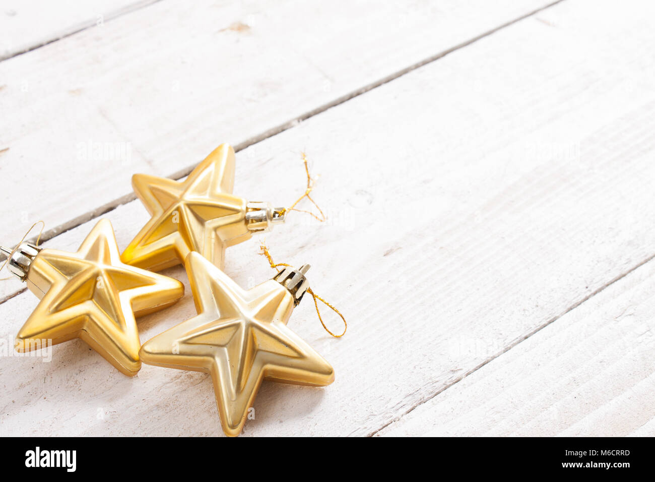 Bright golden christmas decoration, stars with reflection isolated on ...
