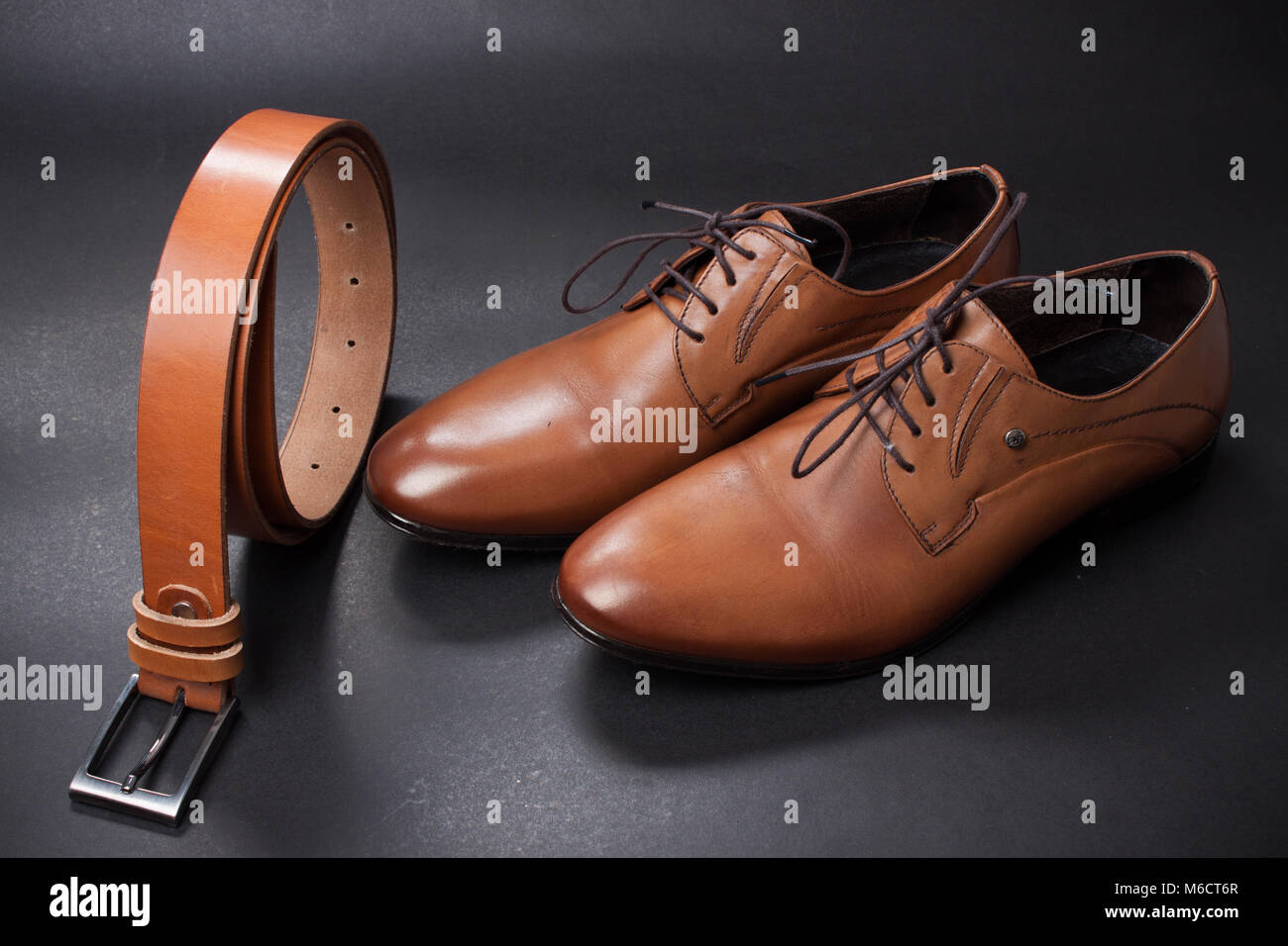 stylish leather men's dress shoes and belt Stock Photo Alamy