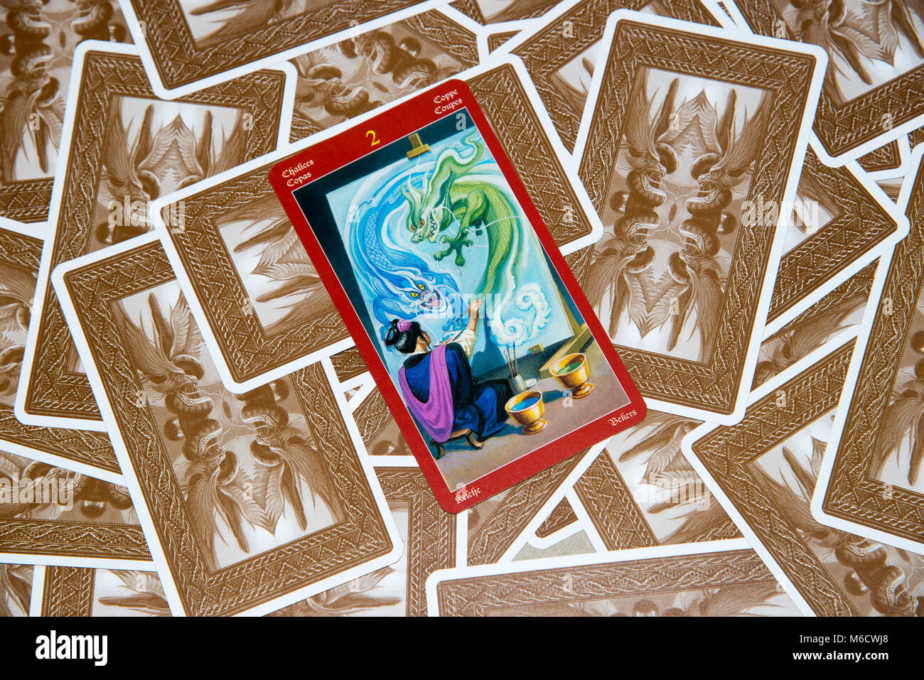 Moscow, Russia - February 18, 2018: Tarot card Two of Cups. Dragon tarot deck. Esoteric mysterious background in gothic style Stock Photo