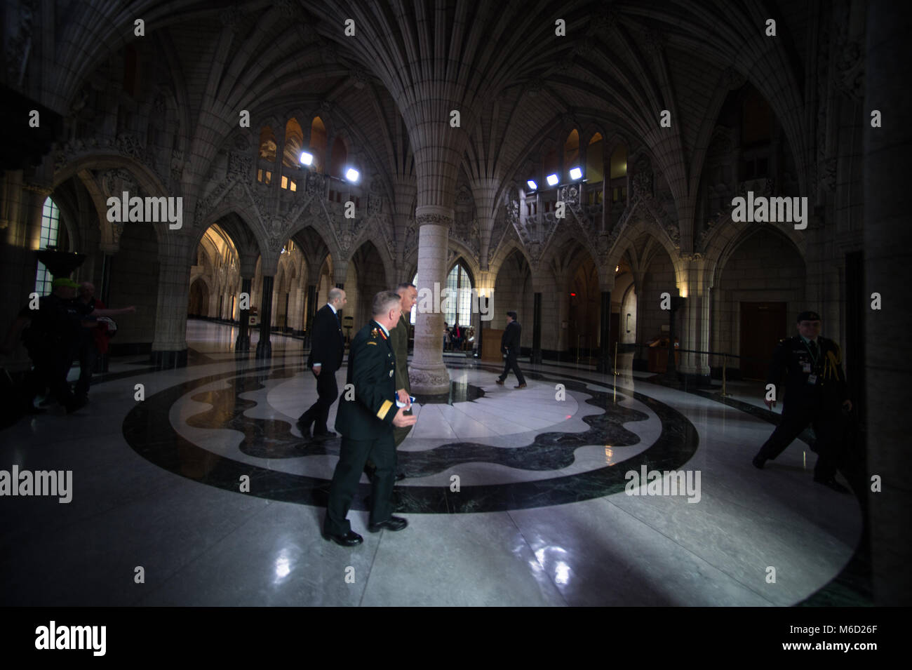 Canadian Gen. Jonathan Vance, Canadian Armed Forces Chief of Defence Staff, and U.S. Marine Corps Gen. Joe Dunford, chairman of the Joint Chiefs of Staff, depart after meeting with the Prime Minister and Minister of National Defence in the Canadian Parliament, Ottawa, Canada, Feb. 28, 2018. Gen. Dunford was in Ottawa for meetings with senior Canadian officials on the ongoing evolution of the North American Aerospace Defense Command. (DoD Photo by U.S. Army Sgt. James K. McCann) Stock Photo