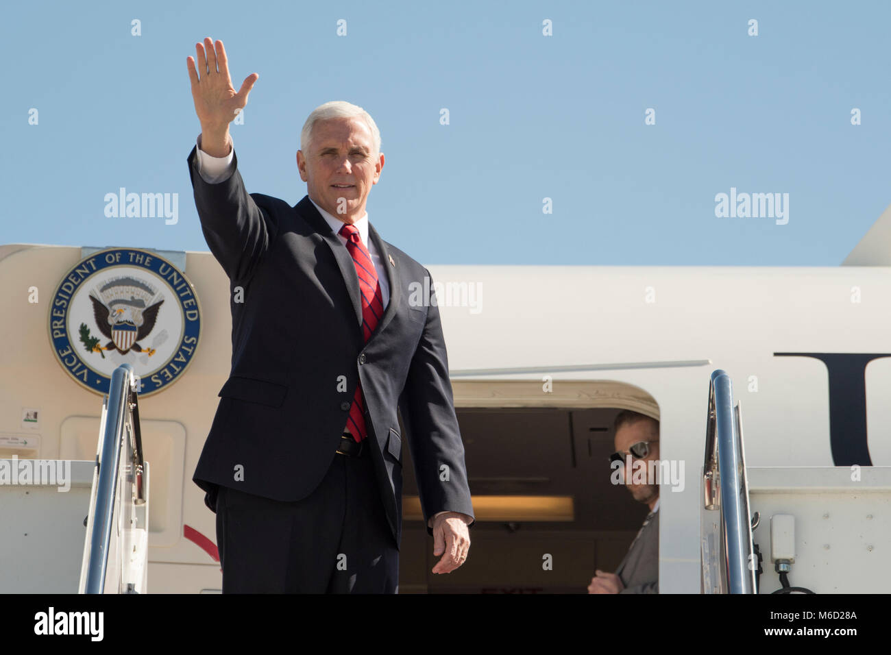 Vice President Mike Pence waves before boarding Air Force Two at Joint Base Andrews, Md., Feb. 27, 2018 before he departs to Nashville, Tenn. The 89th Airlift Wing provides global Special Air Mission airlift, logistics, aerial port and communications for the president, vice president, cabinet members, combatant commanders and other senior military and elected leaders as tasked by the White House, Air Force chief of staff and Air Mobility Command. (U.S. Air Force photo/Tech. Sgt. Robert Cloys) Stock Photo