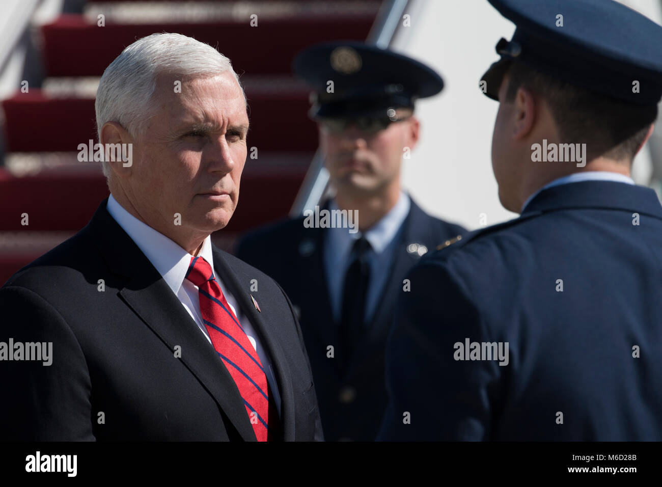 Vice President Mike Pence stops to speak with Maj. Matthew Distefano before boarding Air Force Two on Joint Base Andrews, Md., Feb. 27, 2018. Pence traveled from JBA to Nashville, Tenn. to speak at the National Religious Broadcasters convention. (U.S. Air Force photo/Tech. Sgt. Robert Cloys) Stock Photo