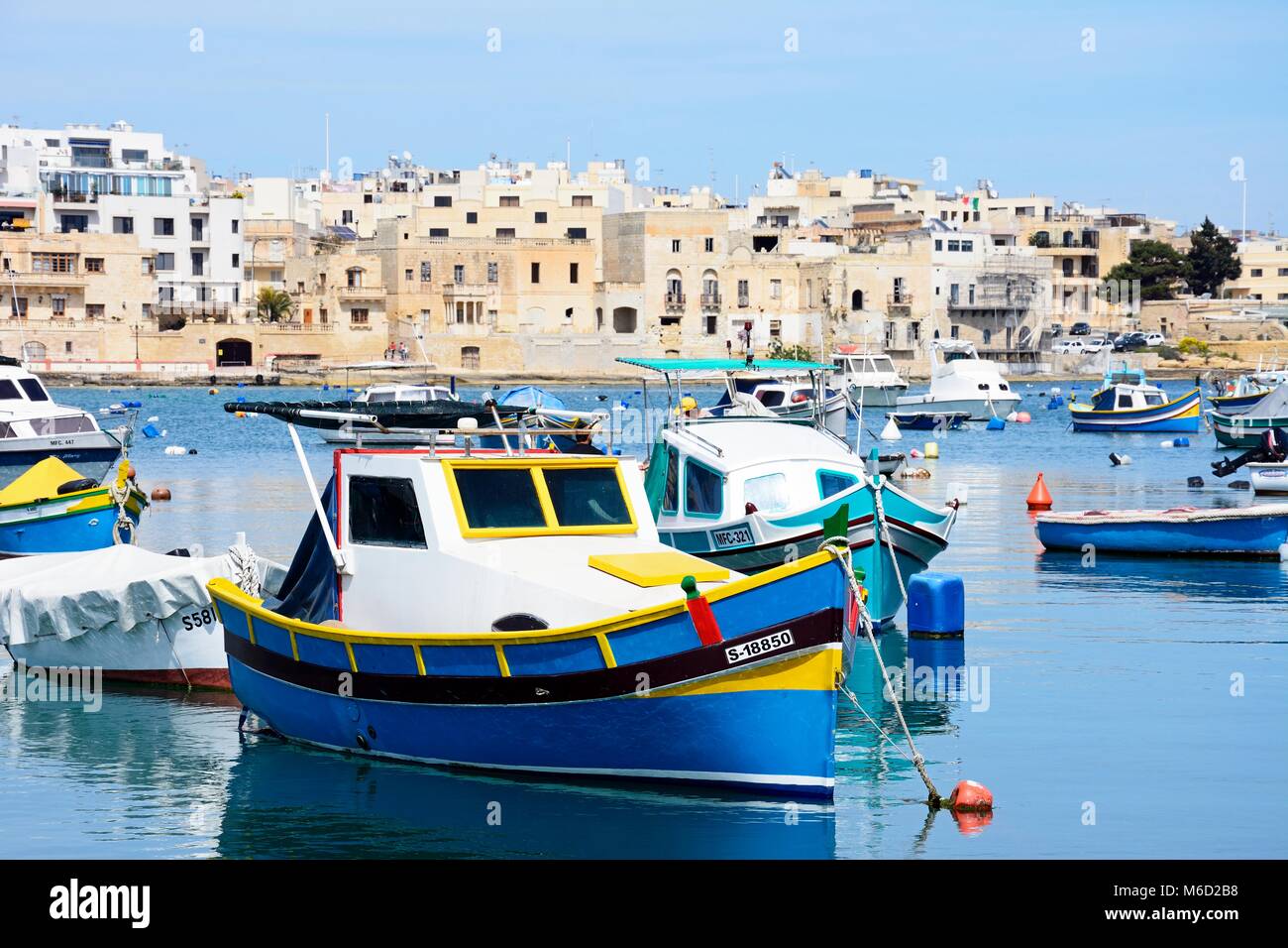 Traditional Maltese fishing boats in the harbour, Birzebbuga, Malta