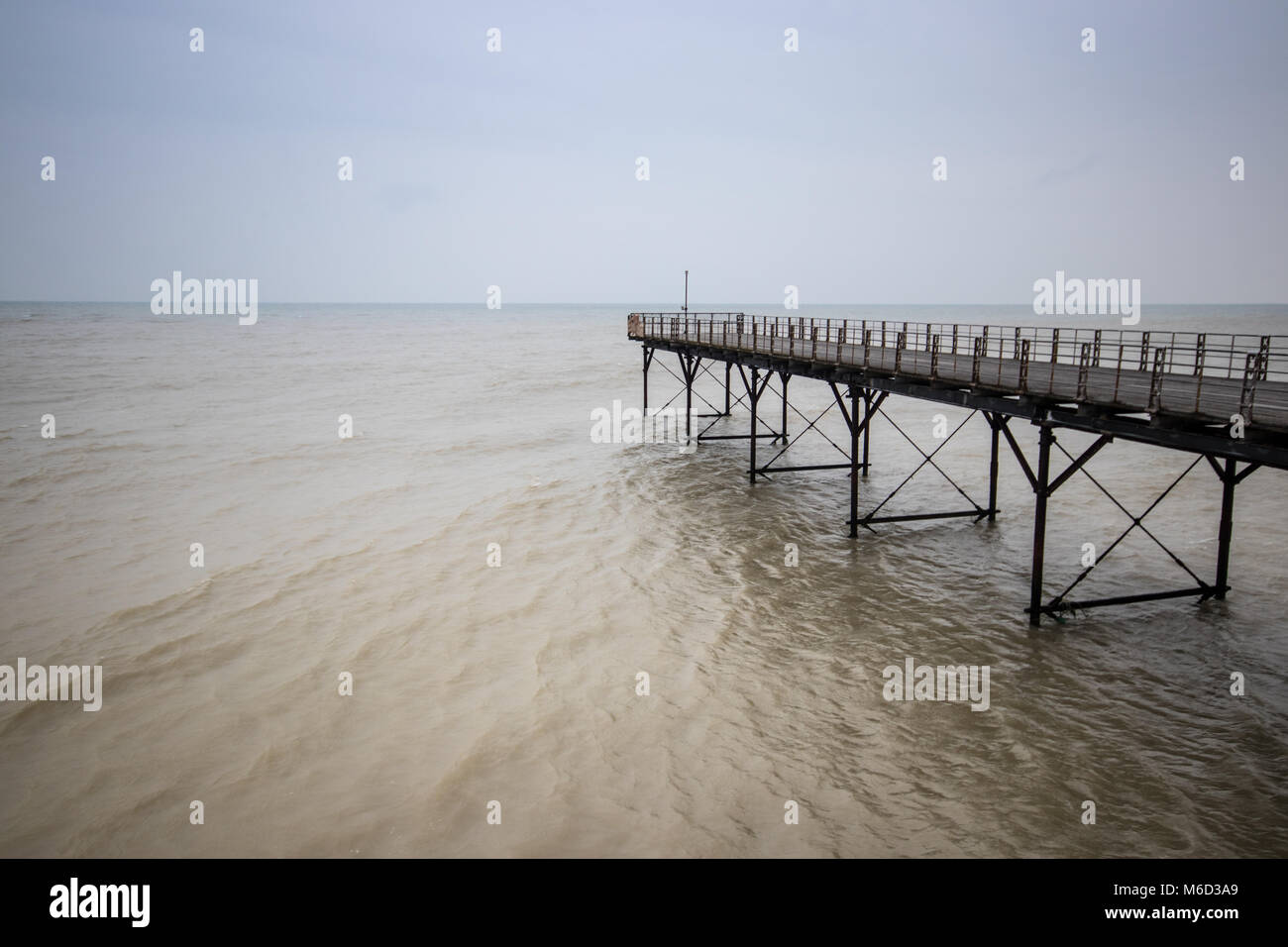 Bognor Regis pier after the Beast from the East and during Storm Emma