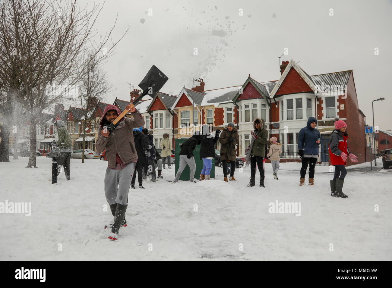 Cardiff, Wales, UK. 2nd Mar, 2018. Cardiff residents enjoy the snow outside the Shri Swaminarayan Mandir, Hindu temple in Grangetown, Cardiff, Following a night of heavy snow and blizzard conditions. Cardiff has been given a red weather alert due to Storm Emma, known also as the Beast from the East. Further snow and bad weather is forecasted throughout the night. Credit: Haydn Denman/Alamy Live News Stock Photo