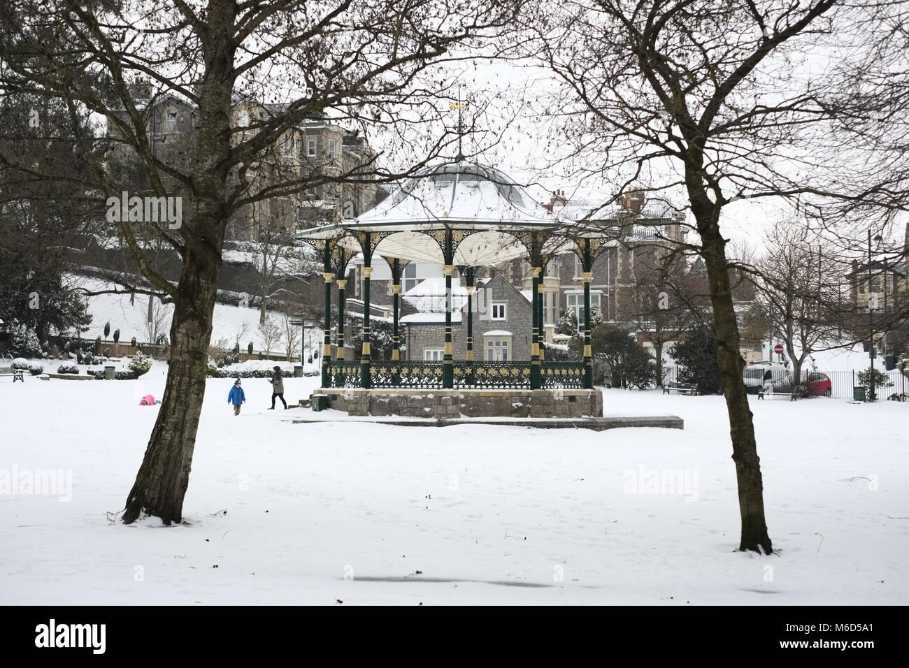 Grove Park.Weston super mare. UK. 2nd March 2018. children play in snow by a band stand. Credit: Alamy Live News Stock Photo