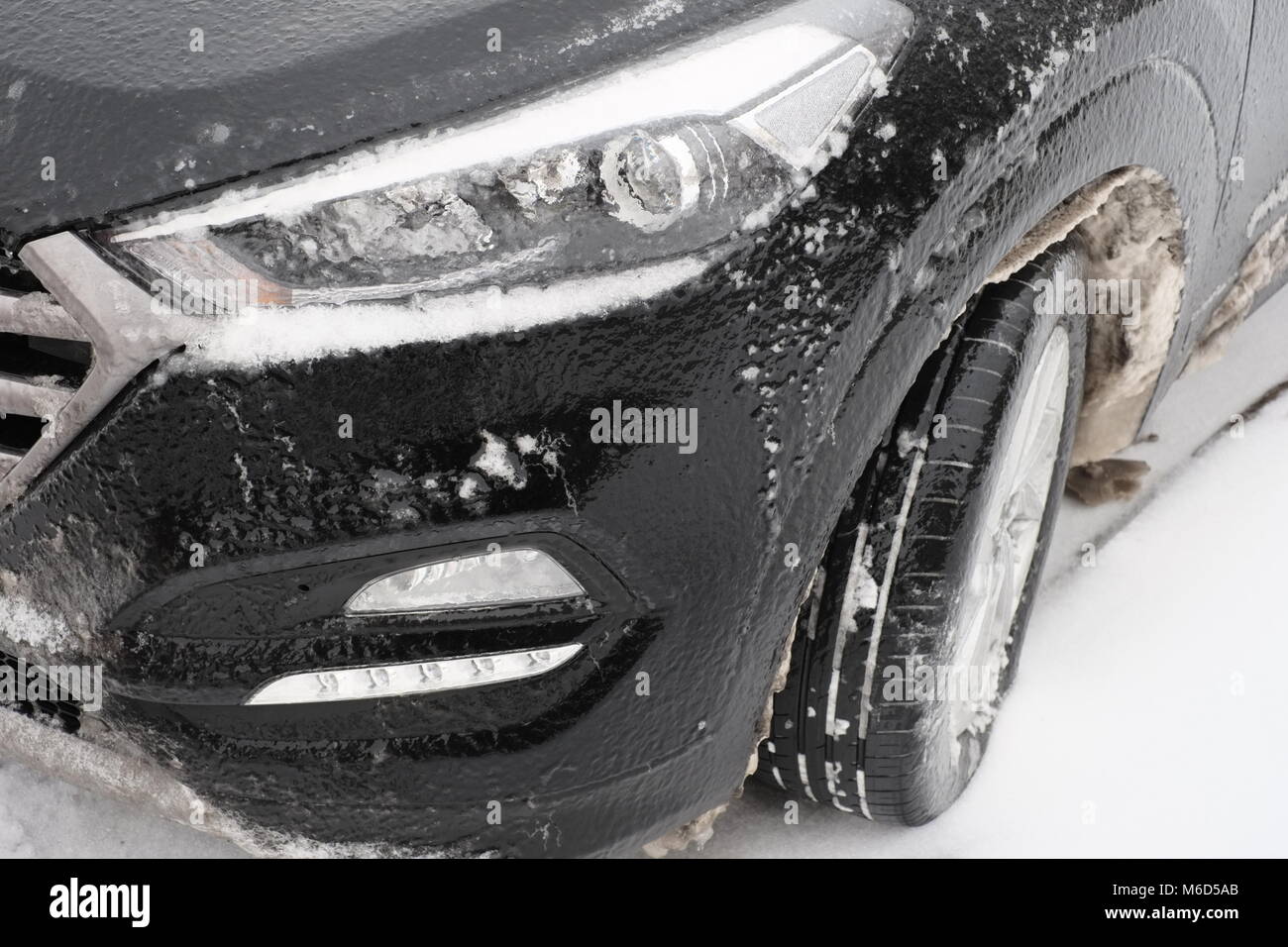 Weston super mare. UK. 2nd March, 2018. The effects of the previous nights snowfall and freezing rain on a parked car. Credit: Alamy Live News Stock Photo