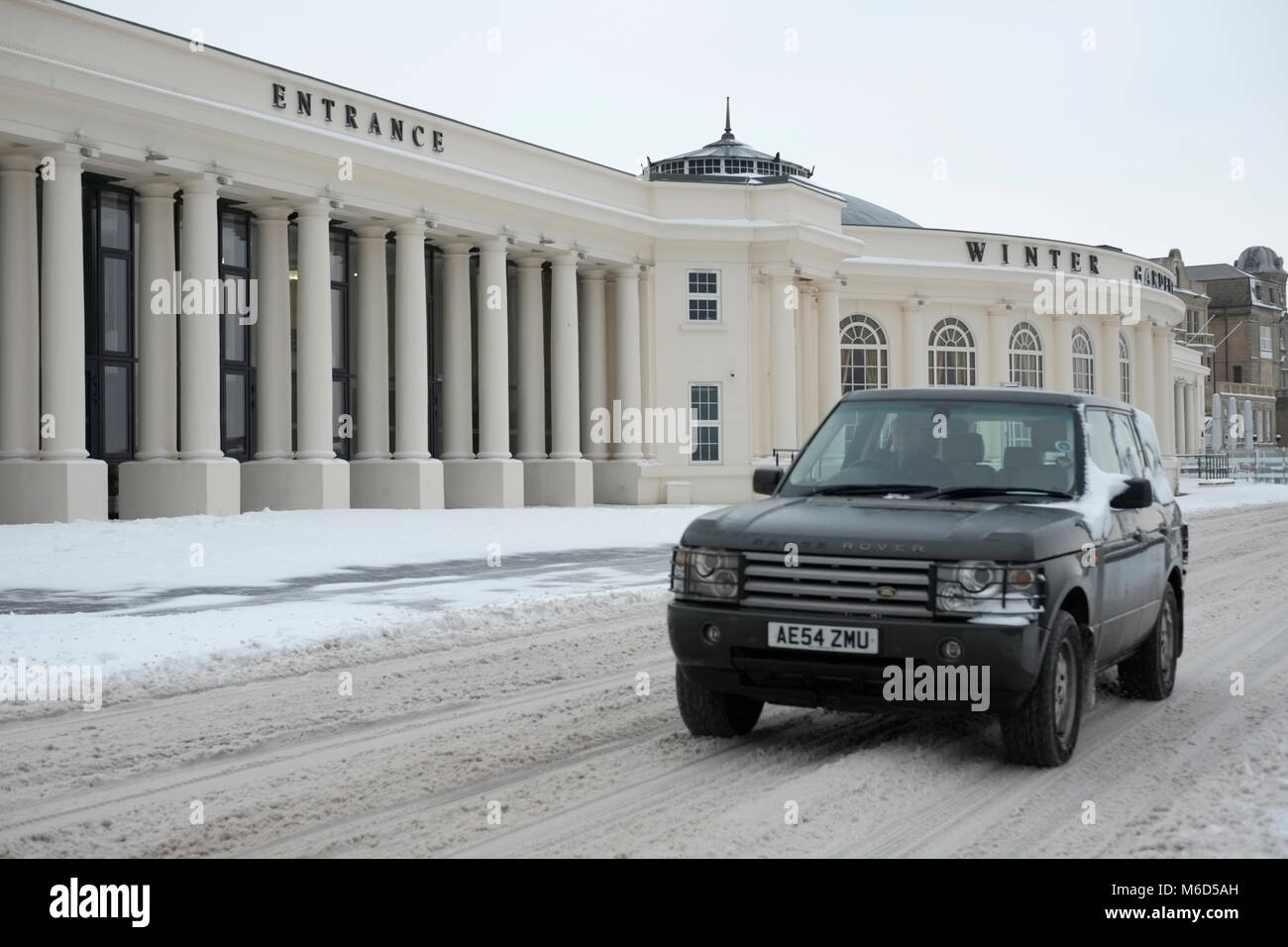 The Winter Gardens, Weston super mare. UK. 2nd March, 2018.A  four wheel drive vehicle braves the roads along the sea front after heavy snow Credit: Alamy Live News Stock Photo