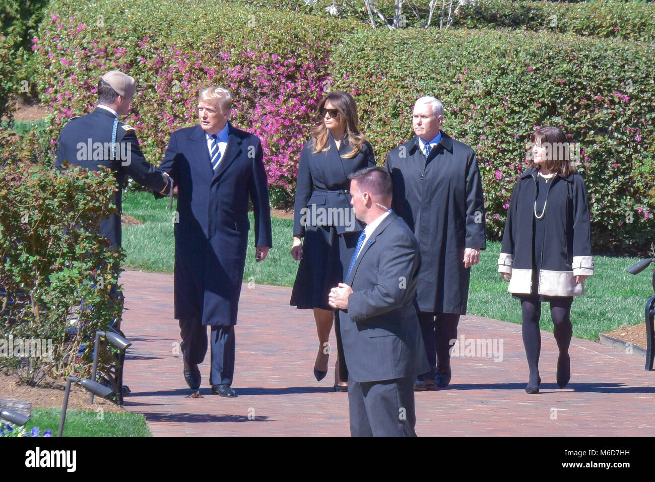 Charlotte, NC, 2 March, 2018.  US President, Donald J. Trump, and VP Mike Pence attending the Billy Graham Funeral in Charlotte earlier today. Their wives, Melania Trump and Karen Pence, accompanied them to the ceremony, held in a 28,000 sq. ft. tent. President Trump attended a Billy Graham crusade with his father, Fred Trump, as a young boy. Credit: Castle Light Images / Alamy Live News. Stock Photo