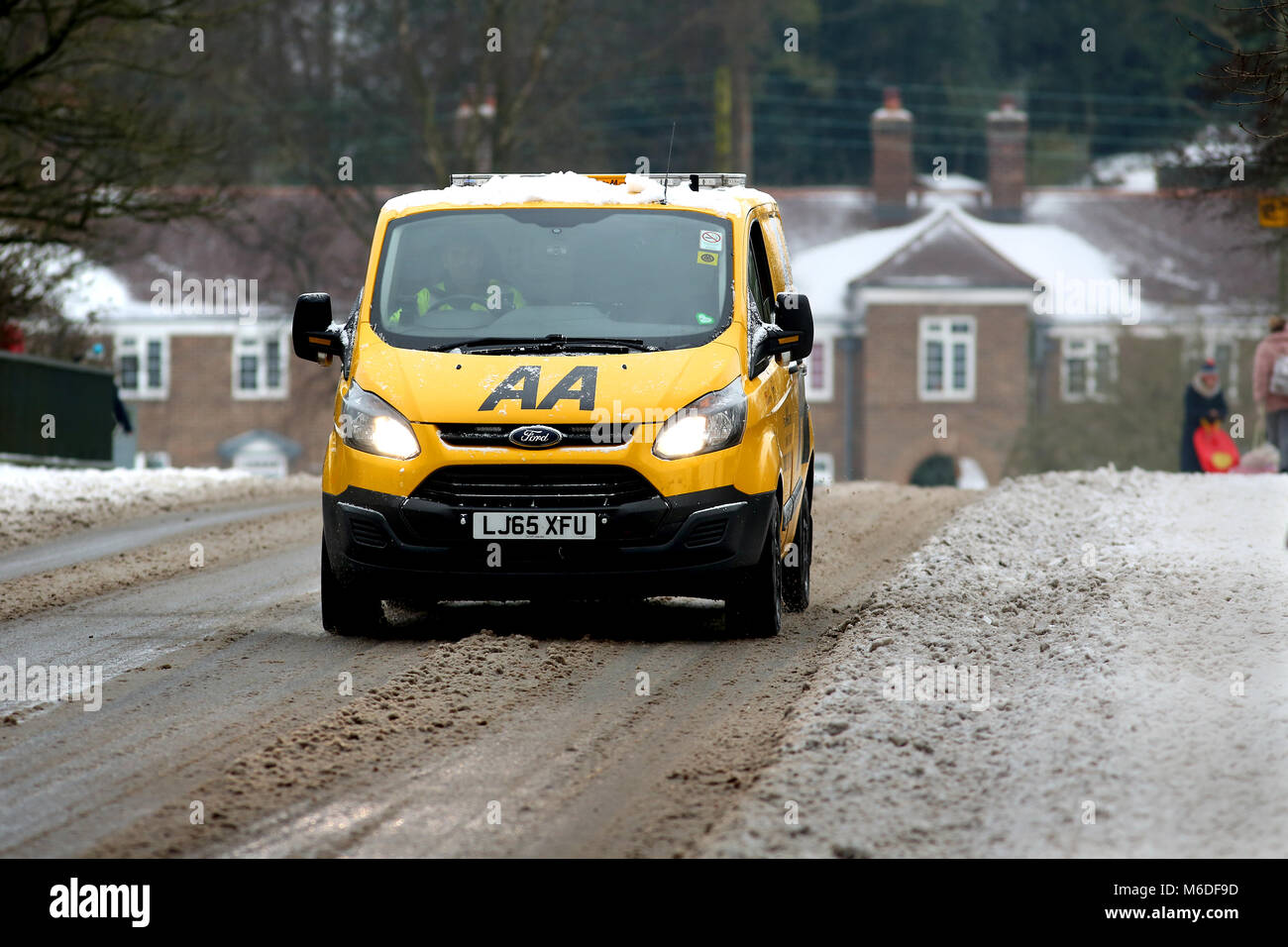 an AA vehicle pictured travelling through the snow Stock Photo Alamy