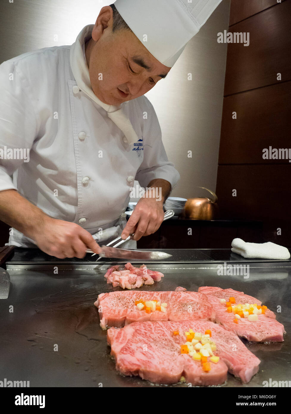 Japanese famous matsuzaka beef steak being cooked in front of the guests at Hama steak house, Roppongi, Tokyo, Japan Stock Photo