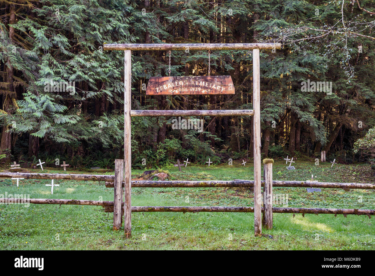 Gate and sign at cemetery near village of Zeballos, North Vancouver Island, British Columbia, Canada Stock Photo