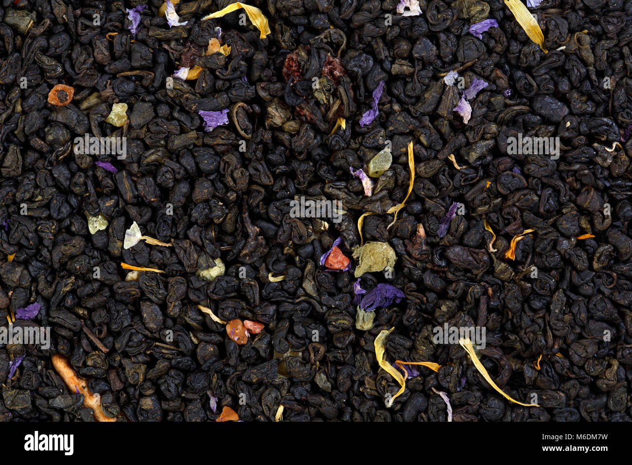 Mix green tea with pineapple, papaya, grapes, rose petals, marigold