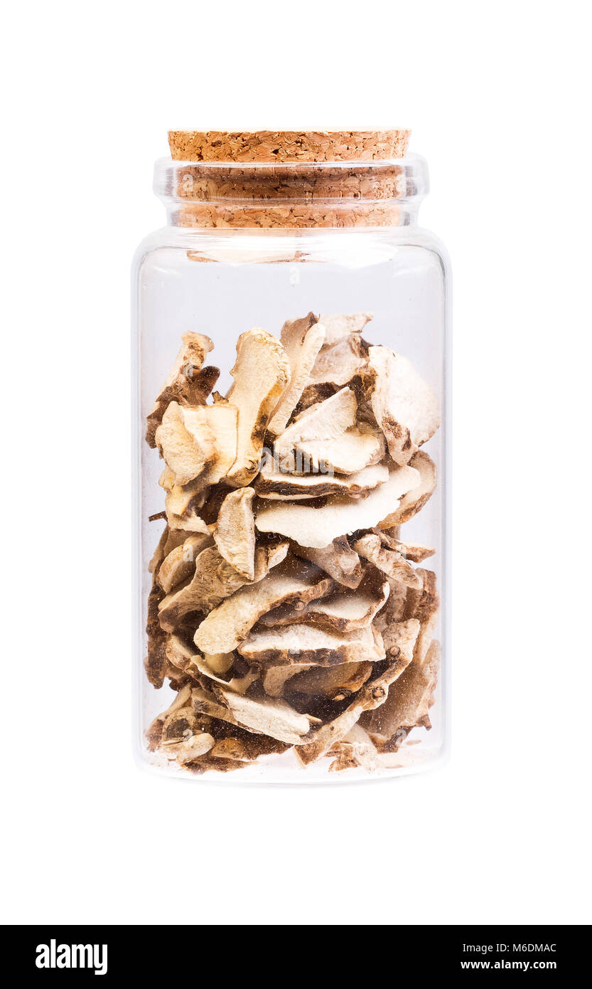 Dioscorea caucasica Angelica sinensis or Female Ginseng in a bottle with cork stopper for medical use. Stock Photo