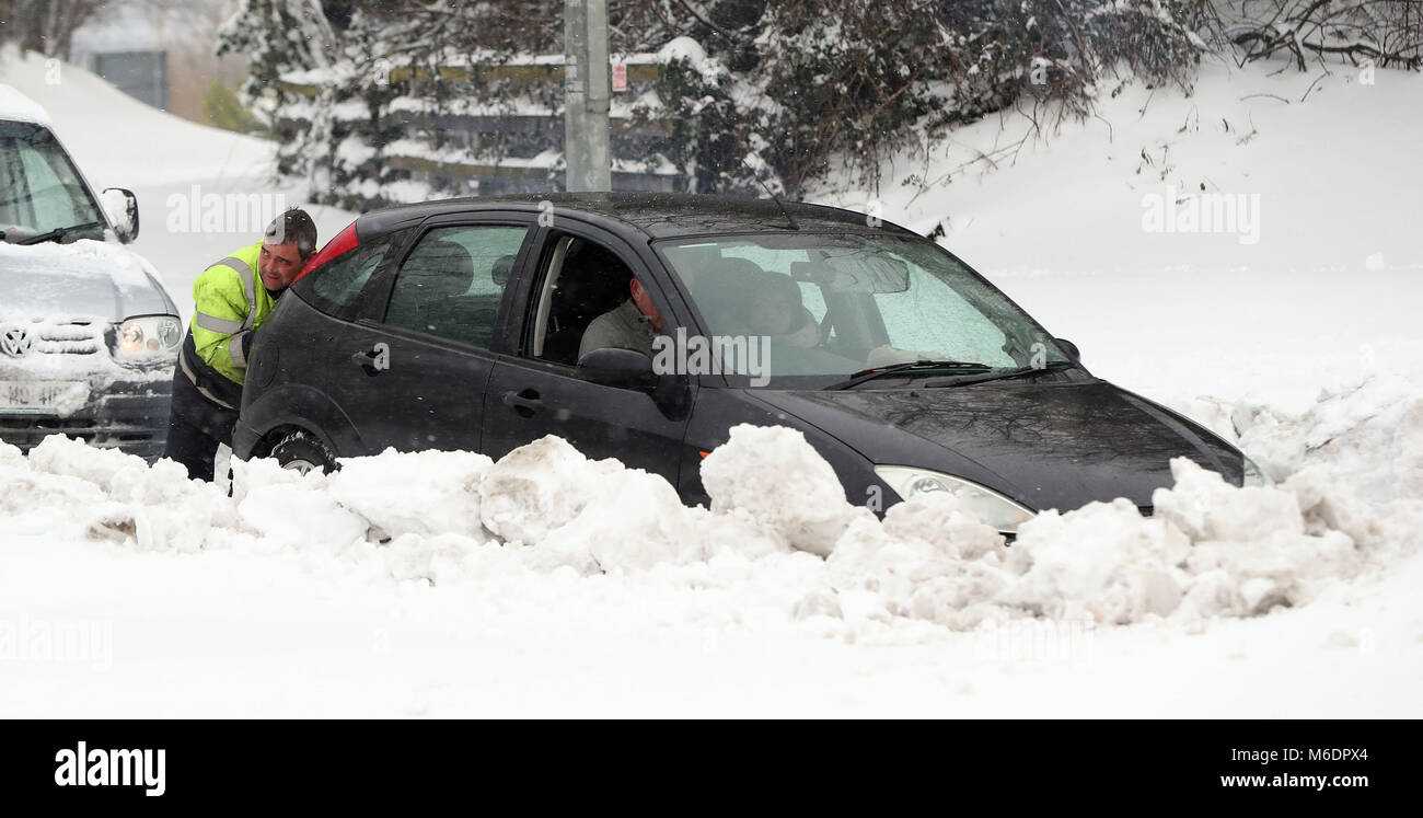 Motorists trapped in the snow near the City West Hotel in Dublin as a status orange weather alert remains in many counties in Ireland. Stock Photo