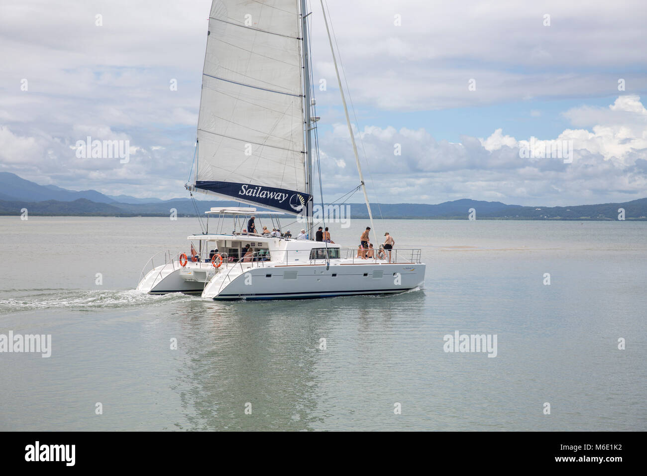 Sailaway tours yacht catamaran leaves Port Douglas heading to the Great