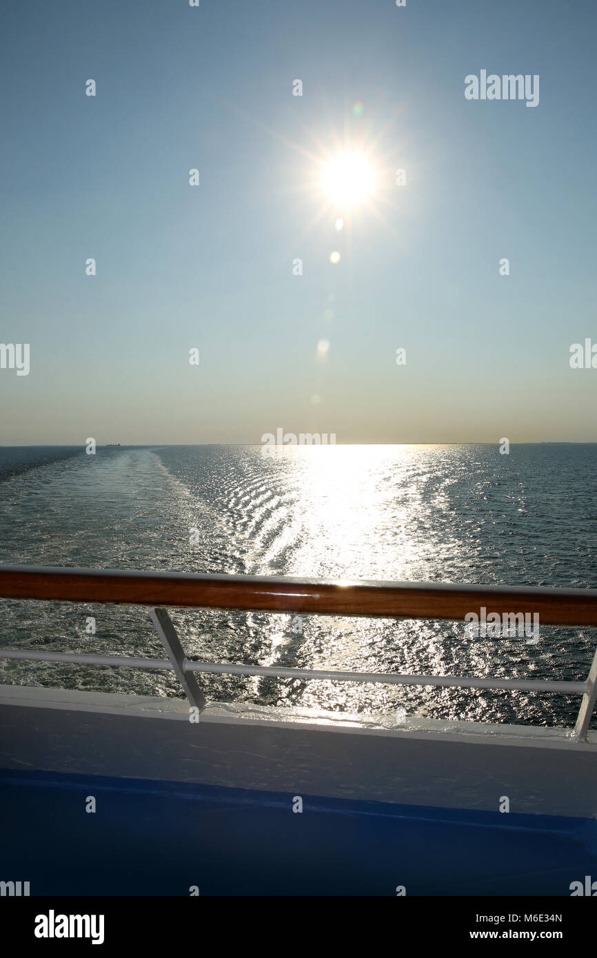 Sunset from the deck of a cruise ship, cruising the Baltic Sea. Stock Photo