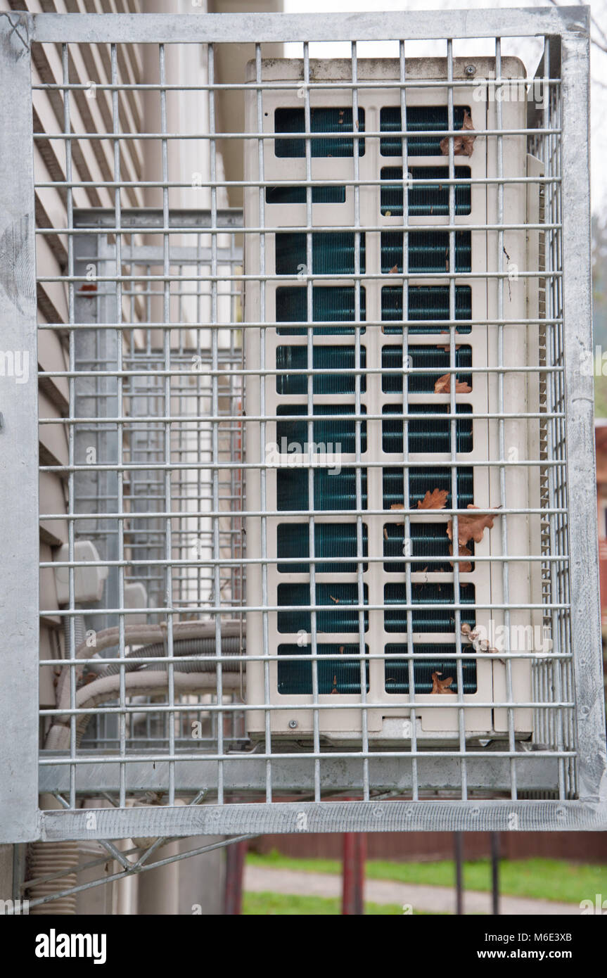 Airconditioning Unit In A Cage Stock Photo Alamy