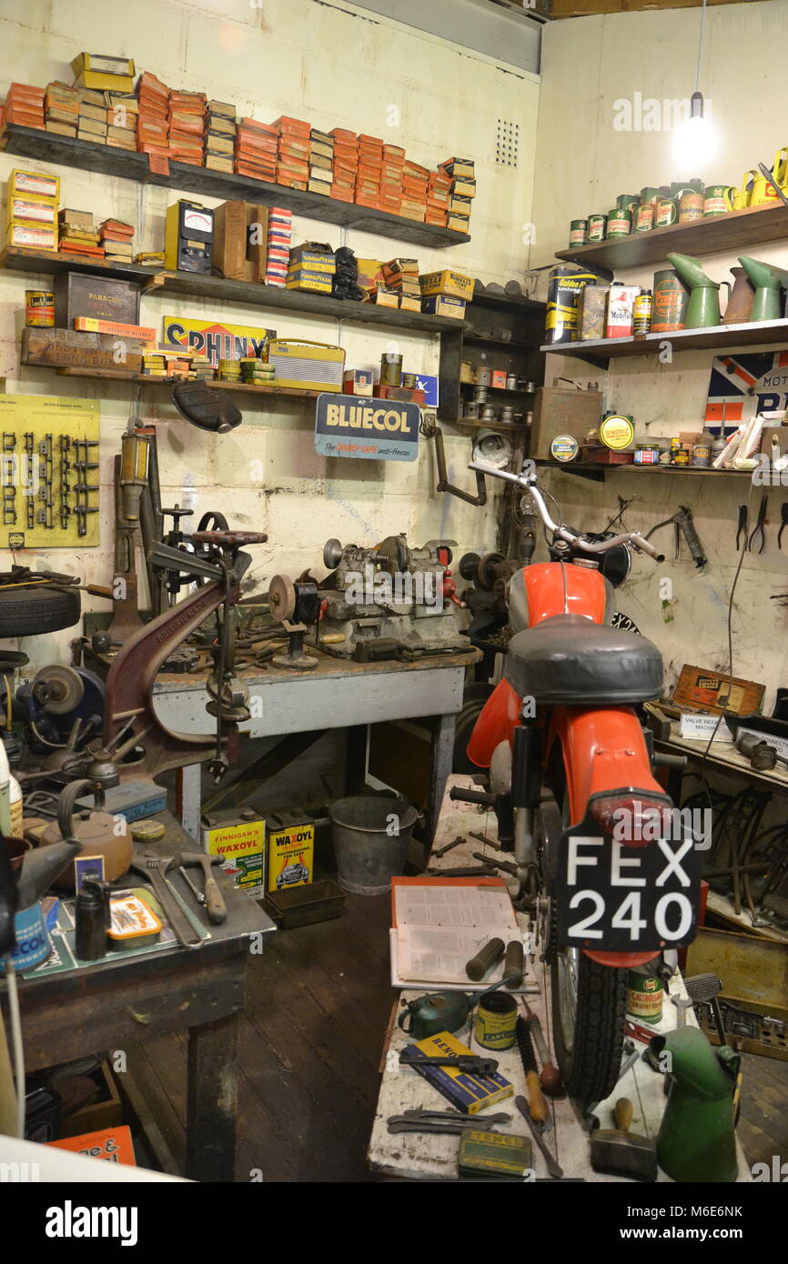 Motorcycle in repair workship at Ipswich Transport Museum, Suffolk
