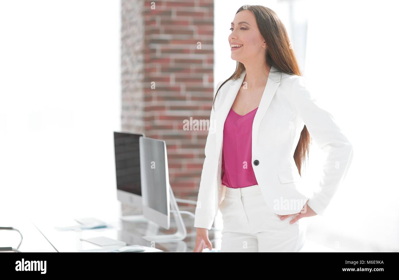 elegant business woman in a white business suit Stock Photo - Alamy
