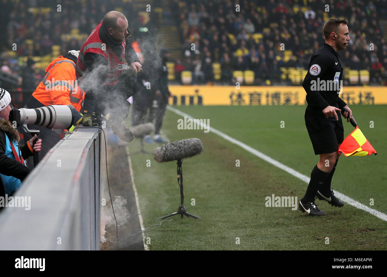 Stewards React As An Advertising Board Catches Fire During The Premier League Match At Vicarage Road Watford Stock Photo Alamy