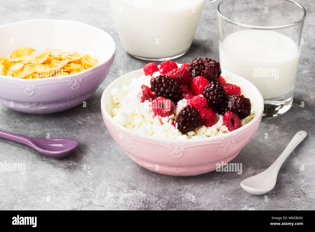 Cottage Cheese In Bowl With Frozen Raspberry And Blackberry And