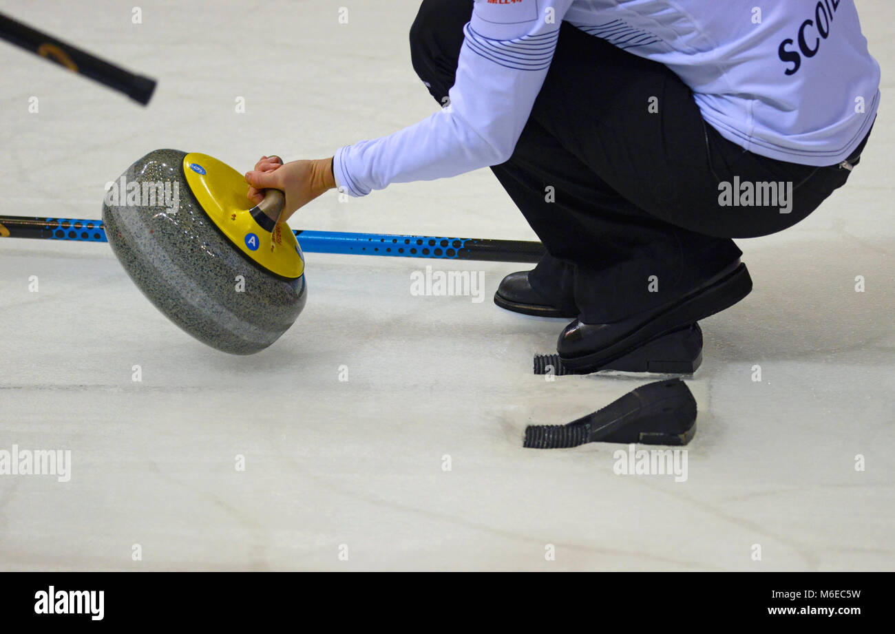 A Scotland player prepares to throw a stone at the CPT World Women's 