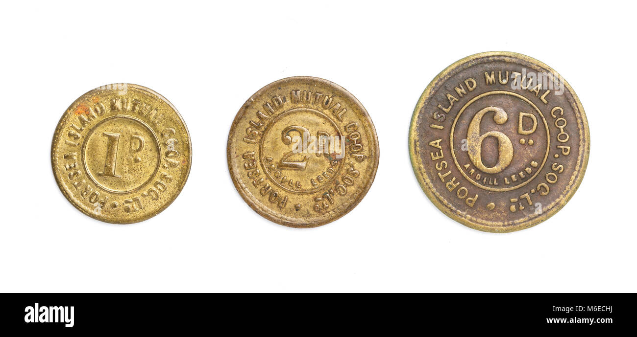 Three tokens issued by the Portsea Island Mutual Co-op  Society Ltd., of Ardhill, Leeds Stock Photo