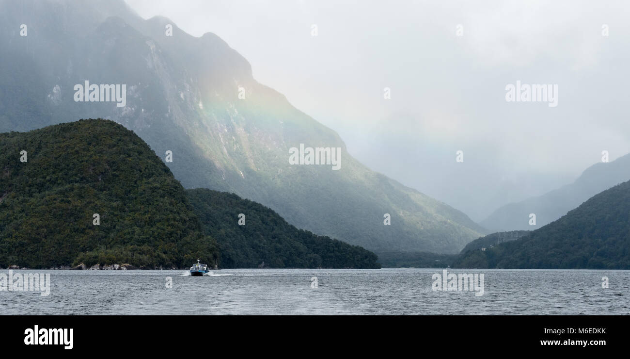 Rainbow across Lake Manapouri, South Island, New Zealand Stock Photo ...