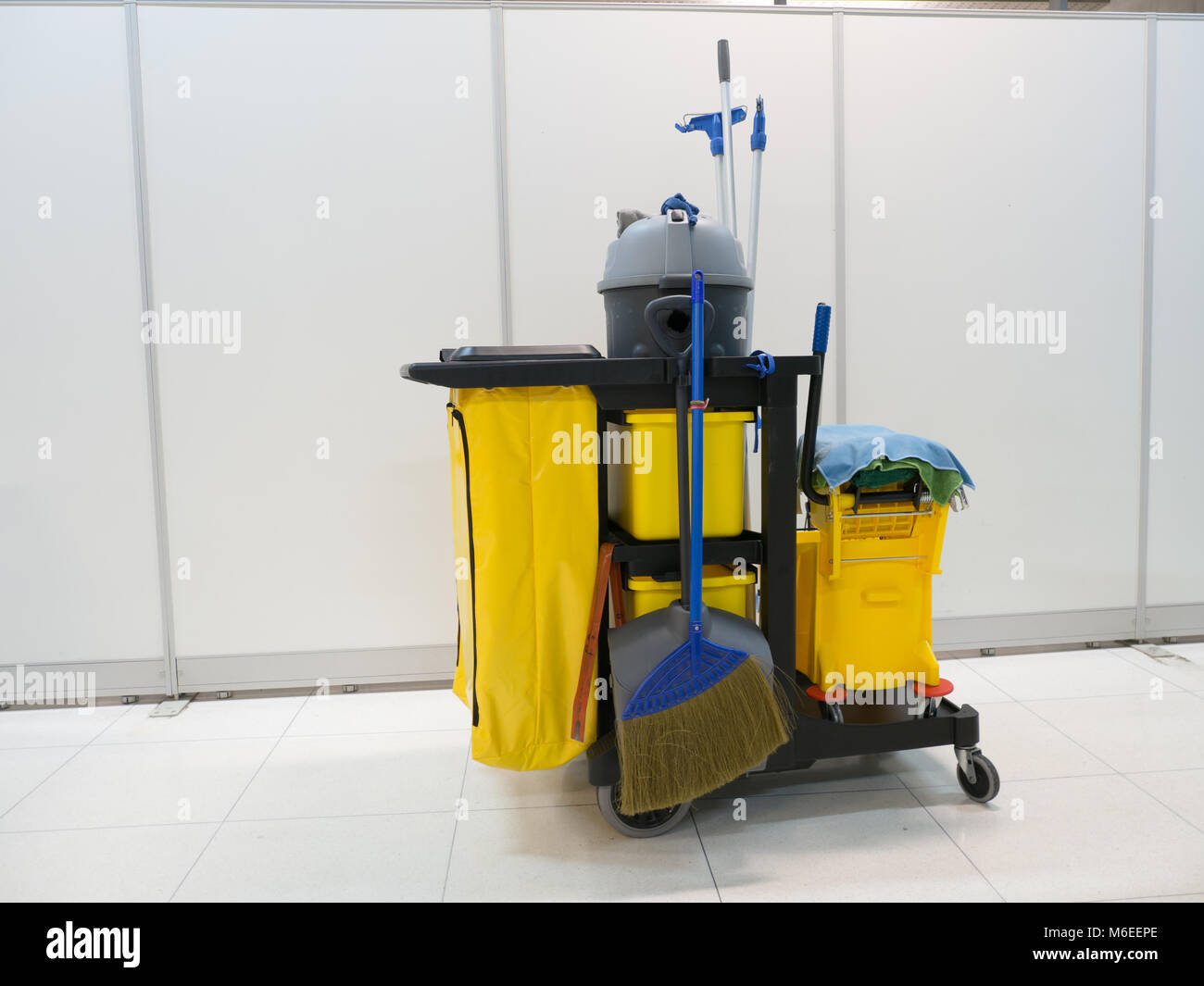 https://c8.alamy.com/comp/M6EEPE/cleaning-tools-cart-wait-for-cleaningbucket-and-set-of-cleaning-equipment-M6EEPE.jpg