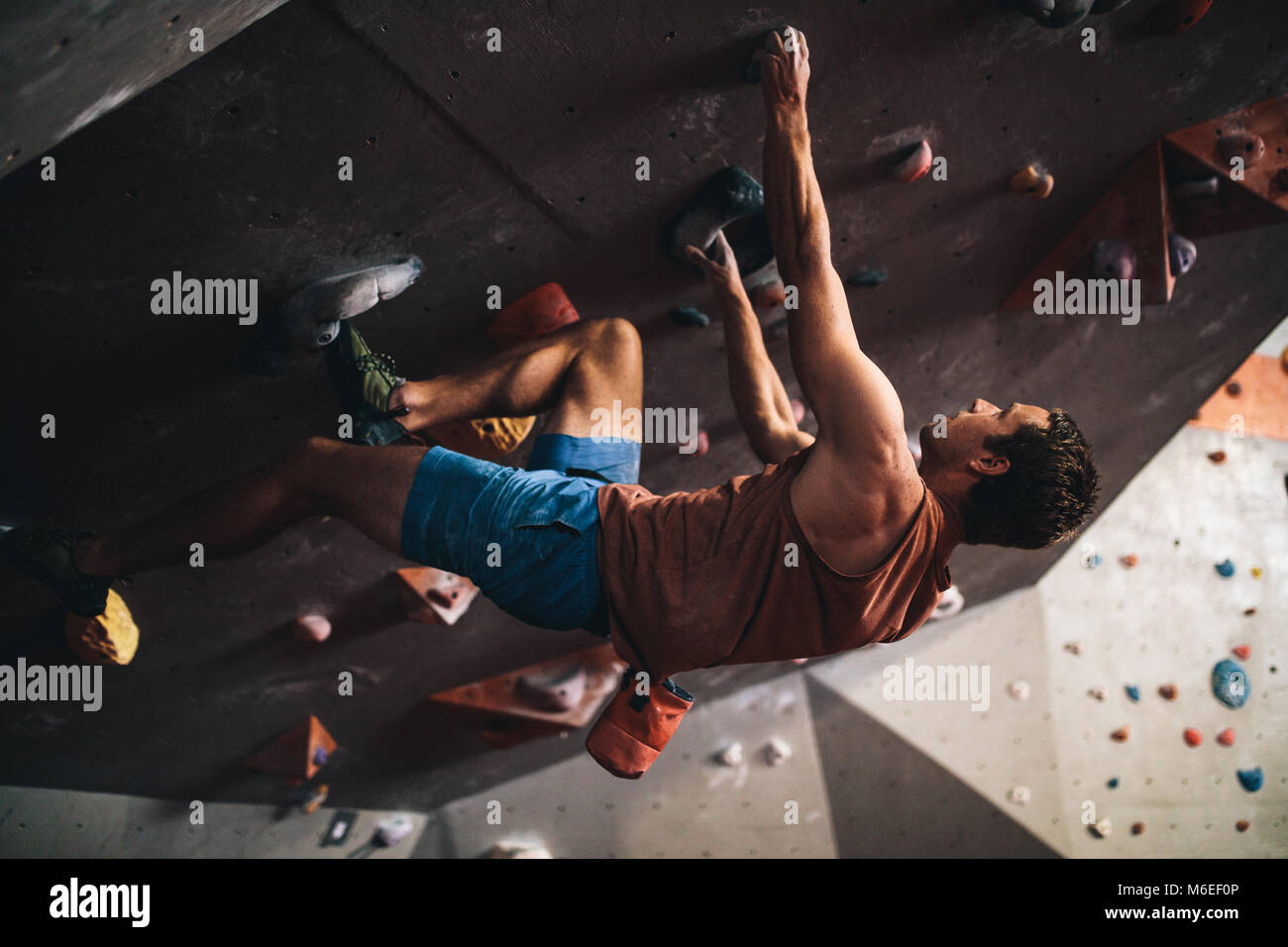 Man upside down rock hires stock photography and images Alamy
