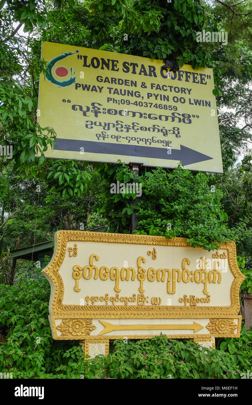 Signs pointing to coffee garden and factory and temple in Pyin Oo Lwin ...