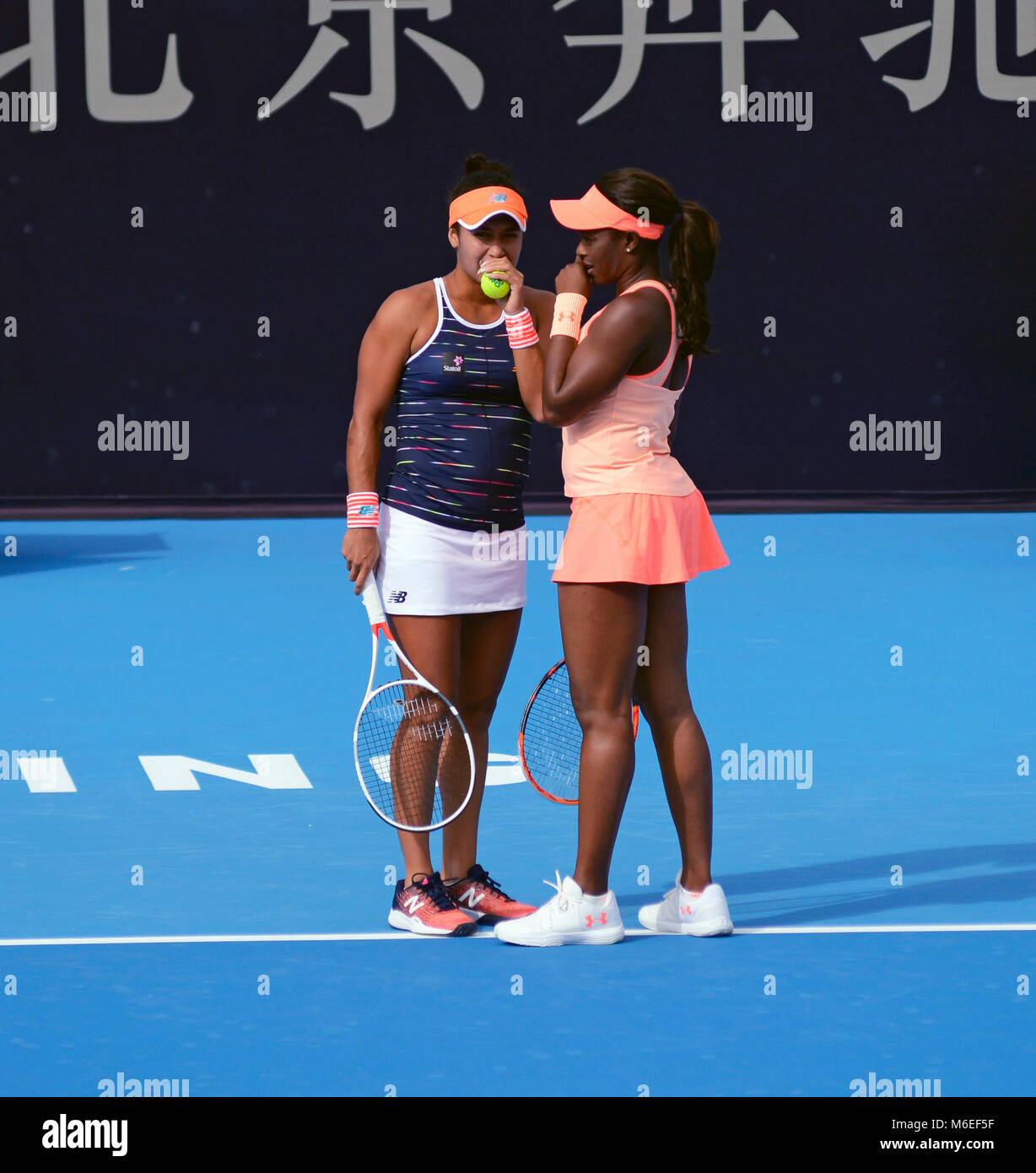 Sloane Stephens of USA plays in the doubles with Heather Watson of Great Britain at the China Open tennis tournament in Beijing, October 2017 Stock Photo