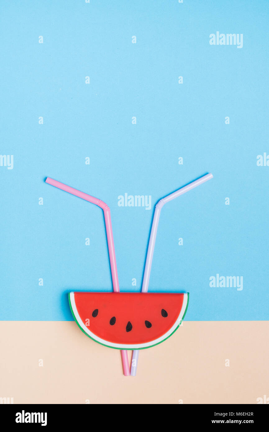 Set of summer watermelon with straw on pastel beige and blue background ...