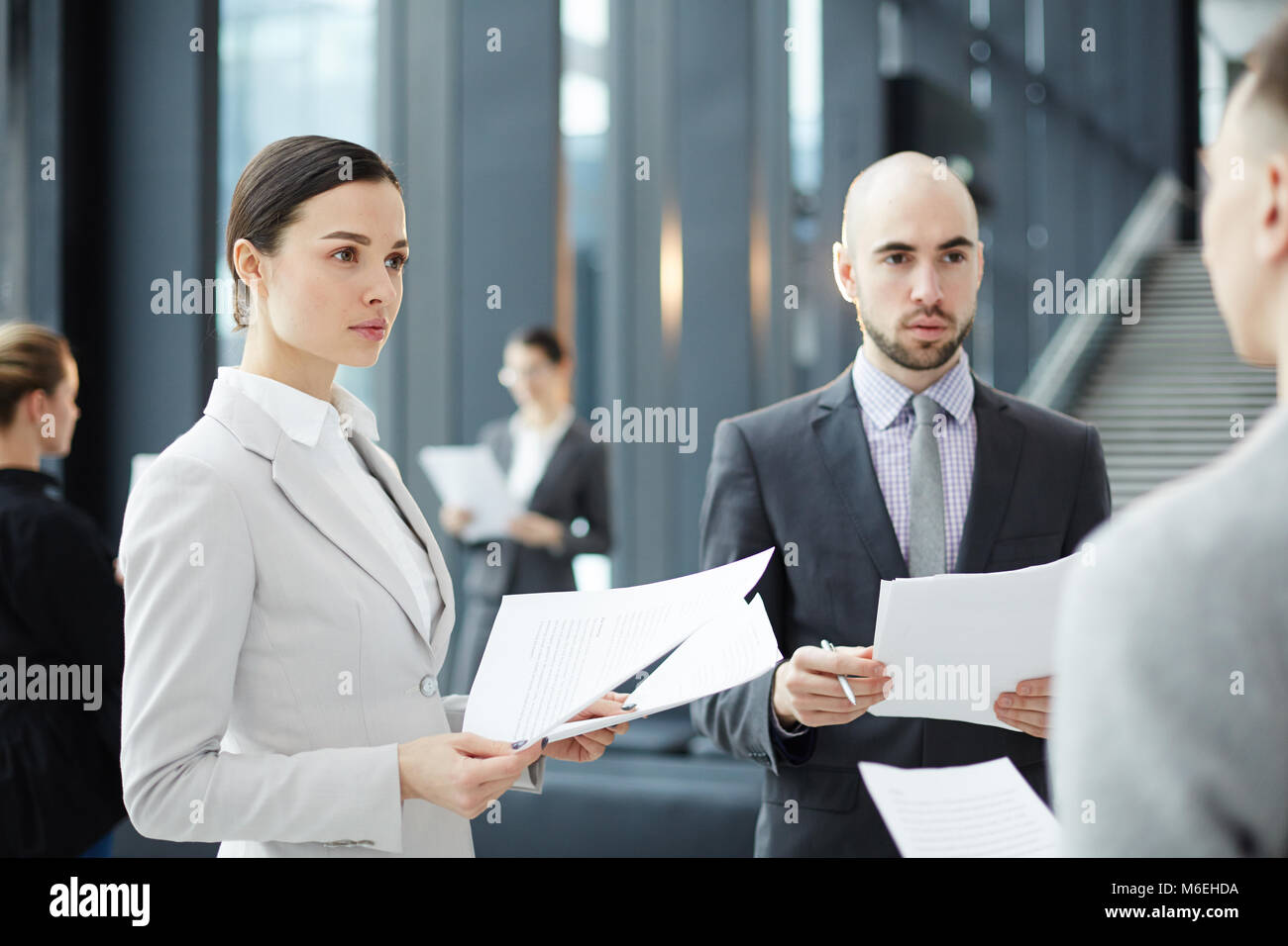 Consulting with expert Stock Photo - Alamy