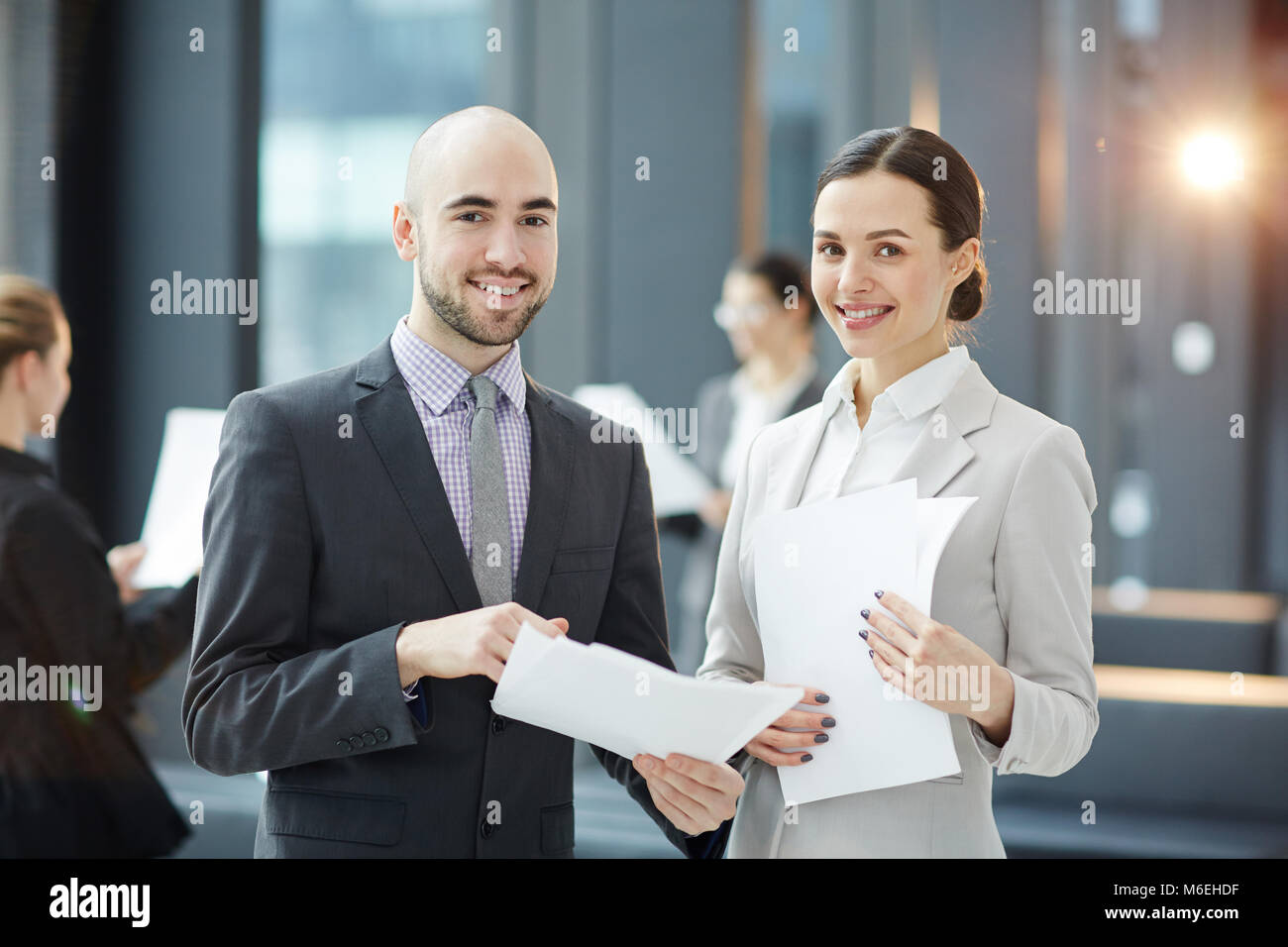 Brokers with papers Stock Photo Alamy