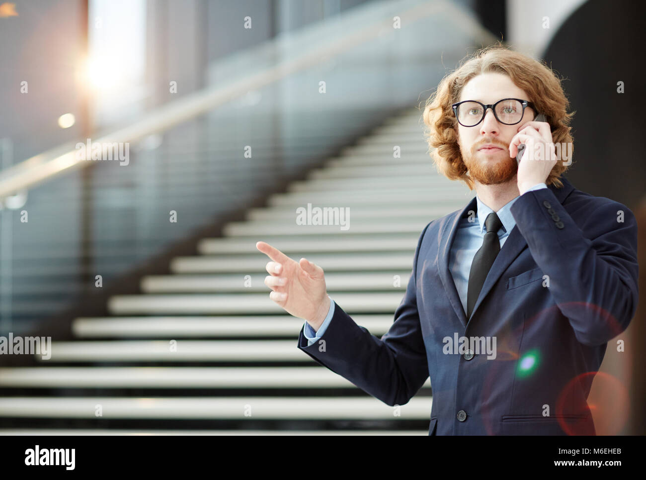 Phoning in airport Stock Photo